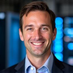 Professional headshot of Ben Carter